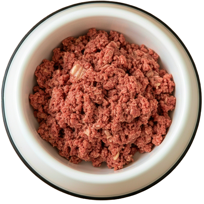 A white bowl of raw ground dog food